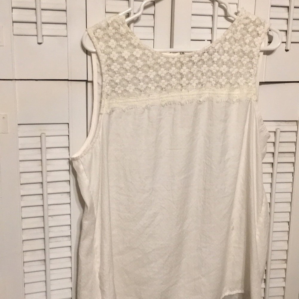 Lovely feminine sleeveless top. Lace bodice.